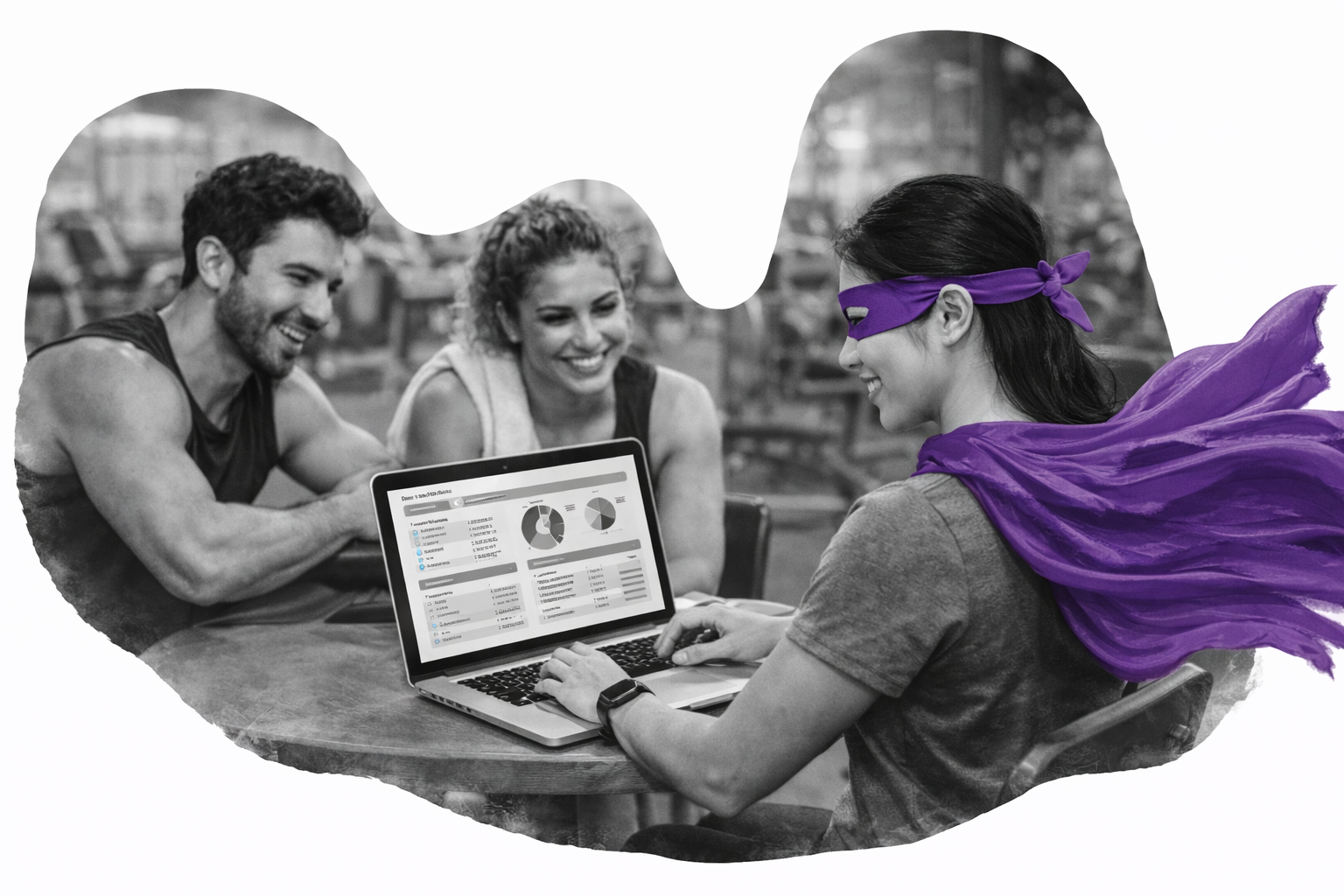 2 people at a gym sitting at a table talking to a Finance Box hero using a laptop